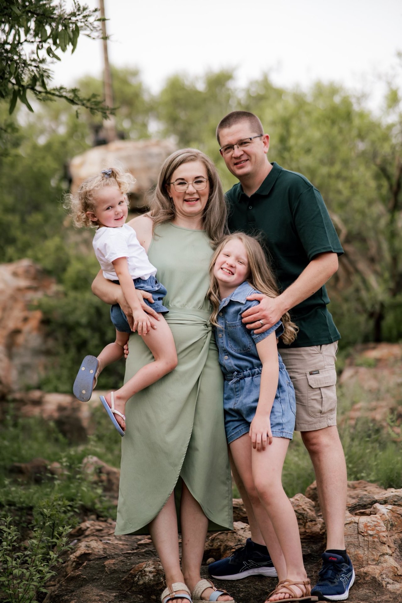 Family portrait among the thorn trees on Solid Ground